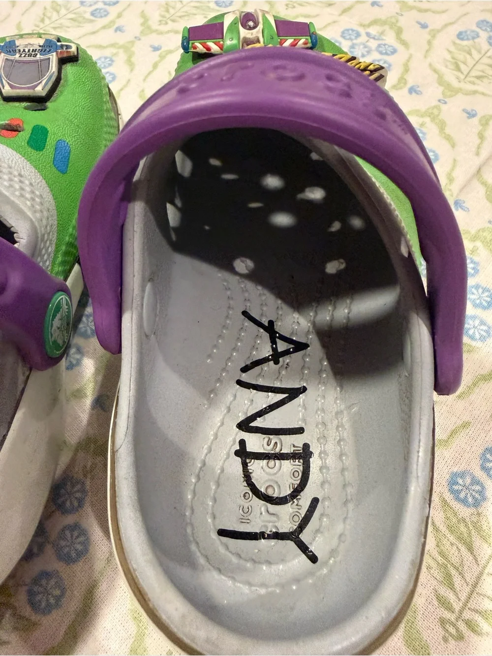 CROCS Kids Green Buzz Lightyear Clogs with Purple Heel Straps